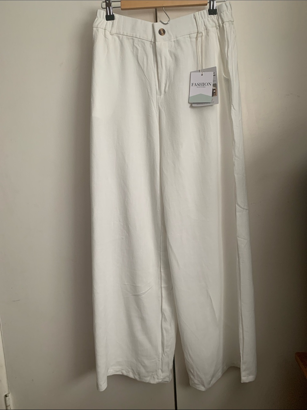 70%Cotton30% linen
Wide-Leg Pants in White